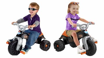 a boy on tike and girl on trike